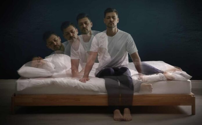 A time lapse photo showing five images of a man getting out of bed, about to go sleepwalking.